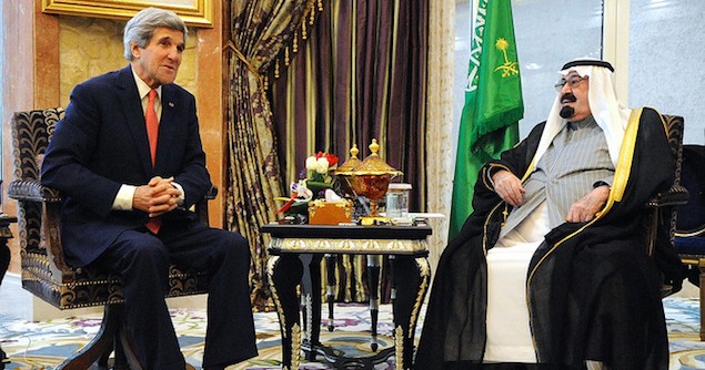 U.S. Secretary of State John Kerry speaks with Saudi Arabia's King Abdullah before their meeting at his desert encampment Rawdat Khuraim on January 5, 2014. Image credit: Flickr (US Department of State)
