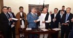 Afghan Presidential Candidates Abdullah and Ghani Shake Hands After Signing Joint Declaration of the Electoral Teams. Image credit: Flickr (US Embassy Kabul Afghanistan)