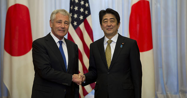 Former Secretary of Defense Chuck Hagel greets Japanese Prime Minister Shinzo Abe in 2014. Image credit: Flickr (Ash Carter) Creative Commons.