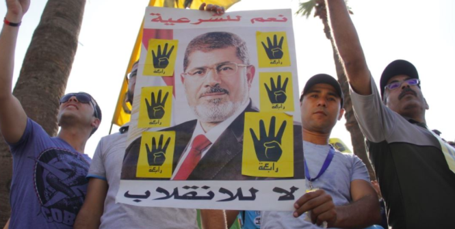 Pro Morsi Protesters after the Coup led by Al-Sisi. Photo Credit: Wikimedia Commons (Hamada Elrasam for VOA) Creative Commons.