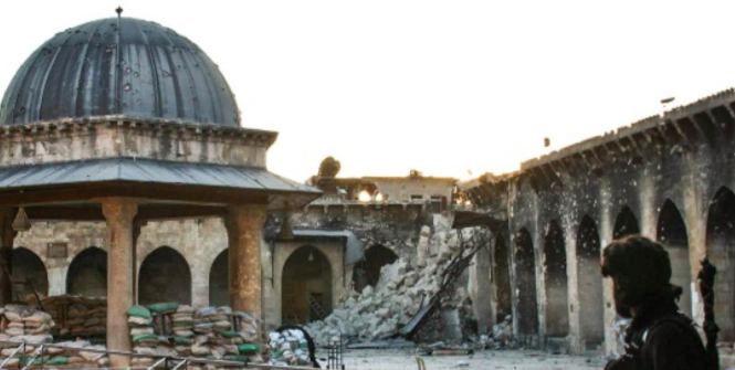 The minaret at the Grand Mosque in Aleppo was destroyed in the fighting. Photo Credit: Wikipedia (Gabriele Fangi, Wissam Wahbeh) Creative Commons.
