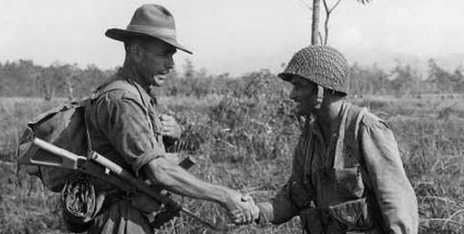 Australian Digger and American Paratrooper meet in 1943. The alliance between Australian and America has long been defined by the friendship from the Second World War. Photo Credit: Flickr (State Library Victoria Collections) Creative Commons.