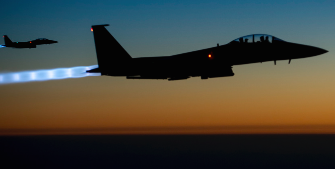 Two U.S. Air Force F-15E Strike Eagle aircraft fly over northern Iraq Sept. 23, 2014, after conducting airstrikes in Syria. Turkish fighter jets have begun to join the fight against ISIS. Photo Credit: Flickr (U.S. Department of Defence) Creative Commons.