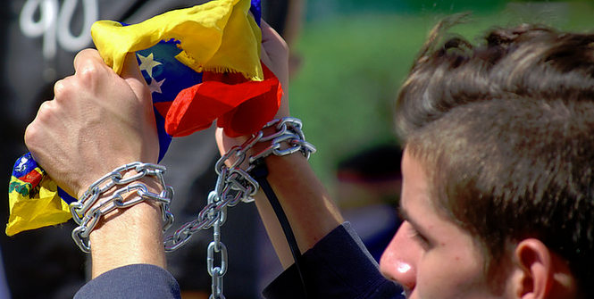 Protest in Caracas, Venezuela. Photo Credit: Flickr (Carlos Díaz) Creative Commons