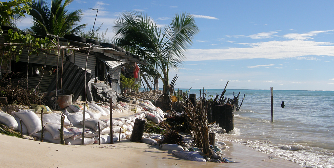 Households on South Tarawa do not have the option to retreat from coastal erosion, as the atoll is narrow and already crowded. Photo Source: Wikipedia (South Tarawa) Creative Commons