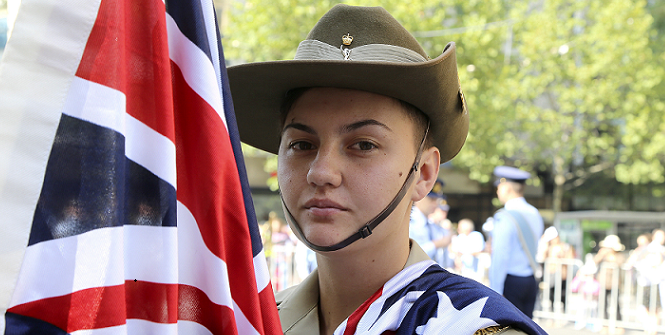 Trainee from Defence Force School of Signals Signalman Payge Condon is one of the flag raiser for the Australia Day Flag Raising Ceremony at Town Hall, Melbourne. Photo Source: Defence Images. 