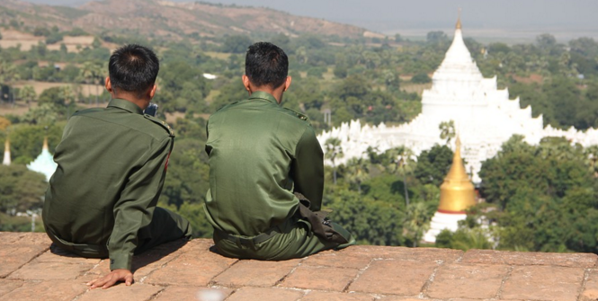 Burmese soldiers look out over a temple. Photo Credit: McLac2000 (Pixabay). Public Domain. 