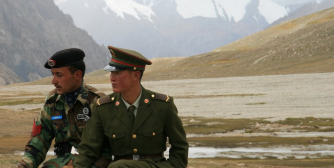 Chinese and Pakistan border guards at Khunjerab Pass. Photo Source: Wikimedia. Creative Commons.