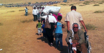 Syrian refugees fleeing to Turkey. Photo source: European Commission DG ECHO (Flickr). Creative Commons.
