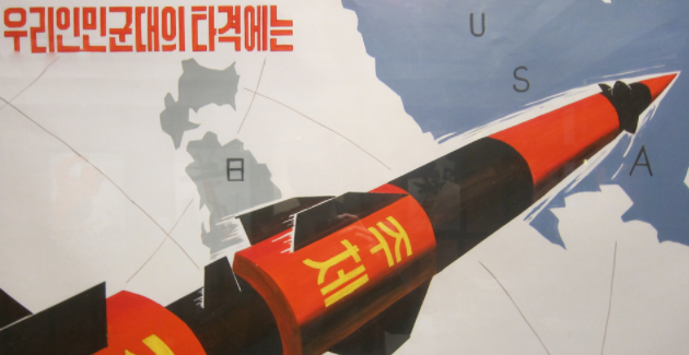 North Korean propaganda poster. Photo: Tormod Sandtorv (Flickr).