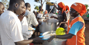 Rations being distributed in Uganda. Photo: Moses Mukitale, World Vision.
