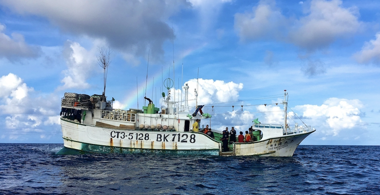 The Australian Fisheries Management Authority and the US Coast Guard board a Taiwanese boat in the Palau exclusive economic zone in 2016. Source: Sara Mooers, Coast Guard News, Flickr