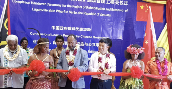 Vanuatu Prime Minister Charlot Salwai cuts the ribbon at the handover ceremony for the controversial Chinese-built Luganville Wharf in August 2017. Source: gov.vu