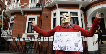 A protester outside the Ecuadorian Embassy in London where Julian Assange sought refuge for nearly seven years. Source: Cancilleria del Ecuador, Flickr, https://bit.ly/1dsePQq