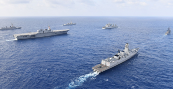 The U.S. Navy guided-missile destroyer USS William P. Lawrence (DDG 110), upper left, transits international waters of the South China Sea with the Indian navy destroyer INS Kolkata (D 63) and tanker INS Shakti (A 57); the Japan Maritime Self-Defense Force helicopter carrier JS Izumo (DDH 183) and destroyer JS Murasame (DD 101); and the Republic of the Philippines navy patrol ship BRP Andres Bonifacio (PS 17). (U.S. Navy photo courtesy of the Japan Maritime Self-Defense Force/Released)
