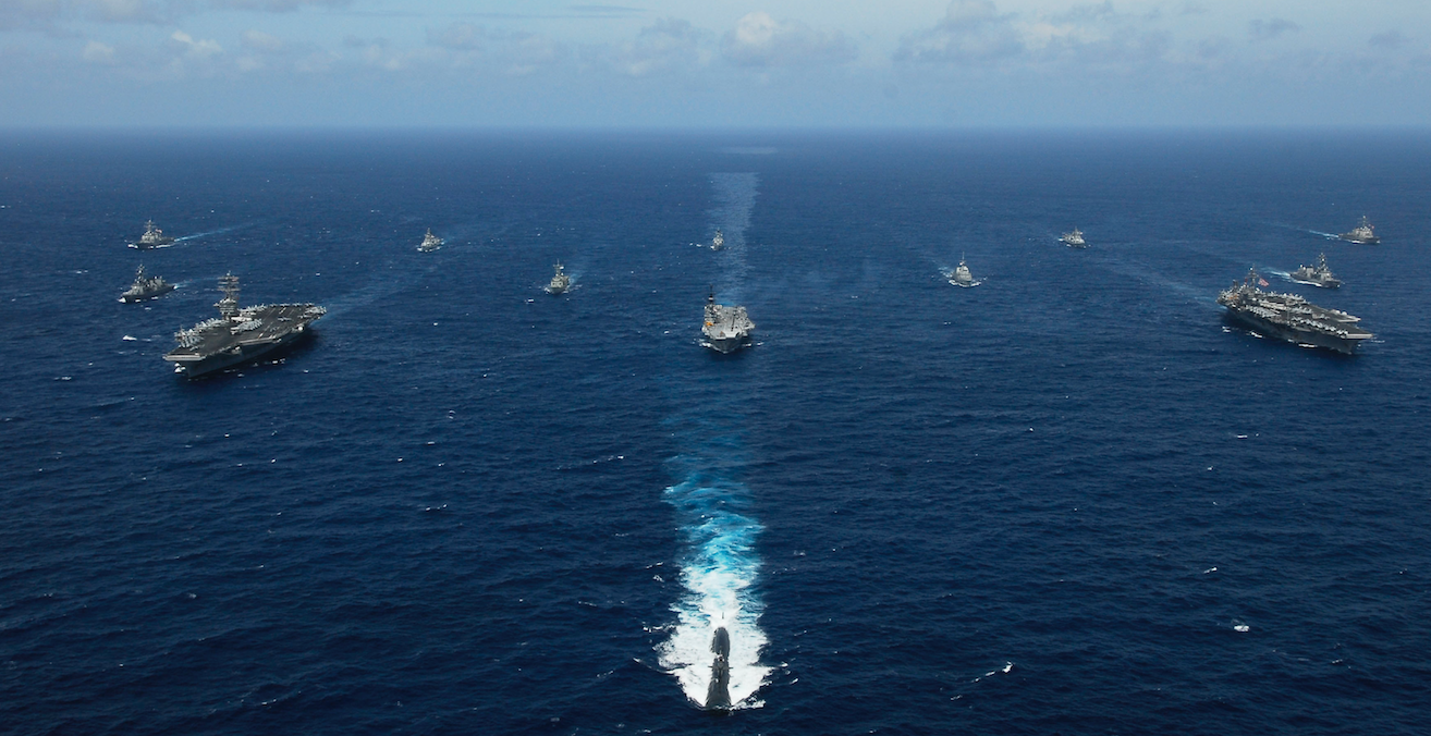 Naval ships in formation, including Indian and Australian vessels. Source: Wikimedia Commons http://bit.ly/2JOw8EO