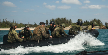 US Marines and Japanese Ground Self-Defense Force navigate the seas in a Combat Rubber Raiding Craft at Kin Blue, Okinawa, Japan, March 3, 2016. Source: US Marines gov website http://bit.ly/2ShucHC