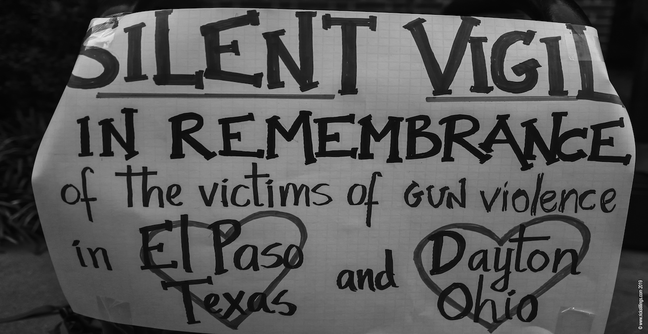 Silent vigil in the remembrance of the El Paso and Dayton victims. Source: Rick Stillings, Flickr, https://bit.ly/2MrygoK
