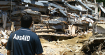 An AusAID staff member examines damage caused by a 7.6 magnitude earthquake in Padang, Indonesia. Australia and Indonesia are working together to improve infrastructure and reduce the risk and impact of natural disasters. Source: Department of Foreign Affairs and Trade, https://bit.ly/31P8y27