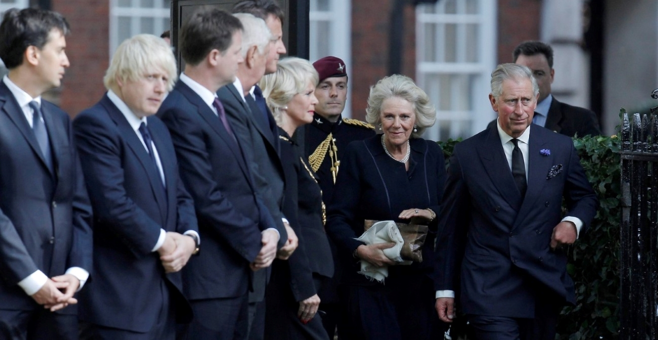 Prince Charles and Duchess of Cornwall, Camilla arrive to greet, Prime Minister David Cameron, U.S. Ambassador Louis Susman, Deputy Prime Minister Nick Clegg, Mayor of London Boris Johnson, and leader of the Labour party David Miliband as they attend the tenth anniversary ceremony to commemorate the attacks on the World Trade Centre in New York at the memorial near to the U.S. Embassy in London September 11, 2011. Source: Luke MacGregor Reuters https://bit.ly/37GSh0A