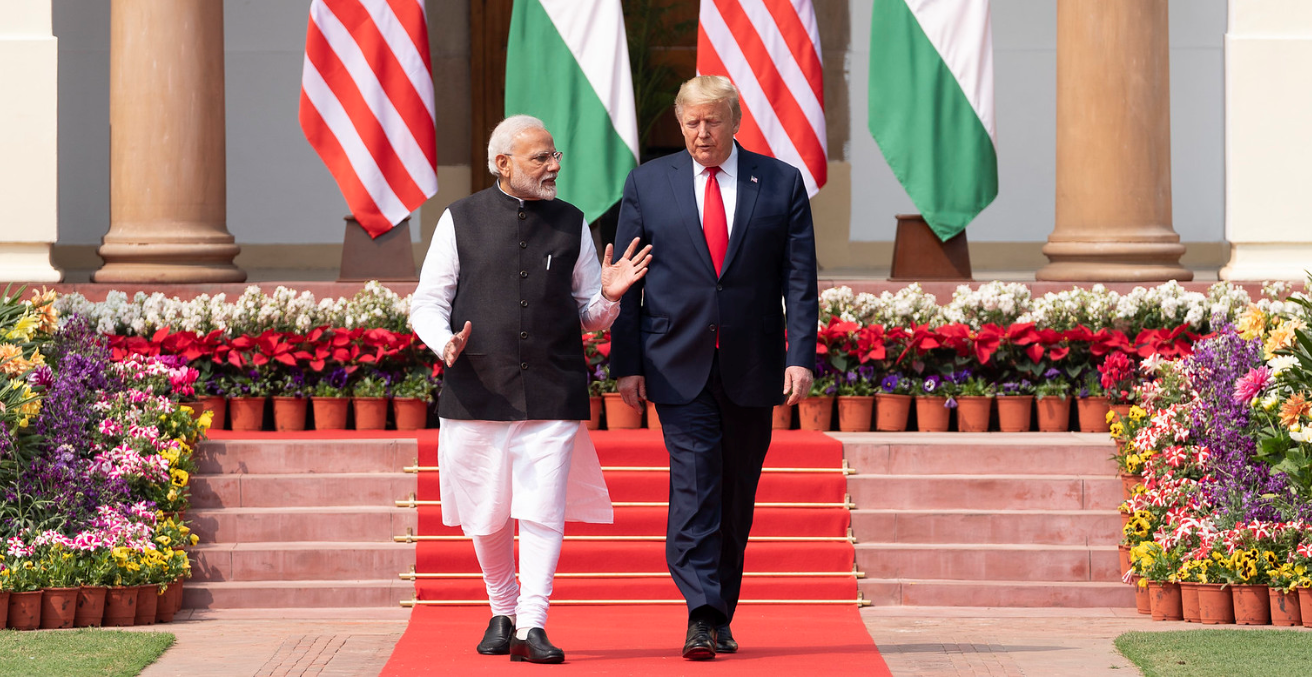 President Donald J. Trump and Indian Prime Minister Narendra Modi walk together from Hyderabad House to deliver a joint press statement Tuesday, Feb. 25, 2020, on the lawn of Hyderabad House in New Delhi. Source: Shealah Craighead https://bit.ly/2PLkQ7d