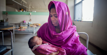 A mom and her newborn baby at the Maternal & Child Health Training Institute for medically needy in Dhaka, Bangladesh.  Source: UN Photo/Kibae Park https://bit.ly/3aHvVOo