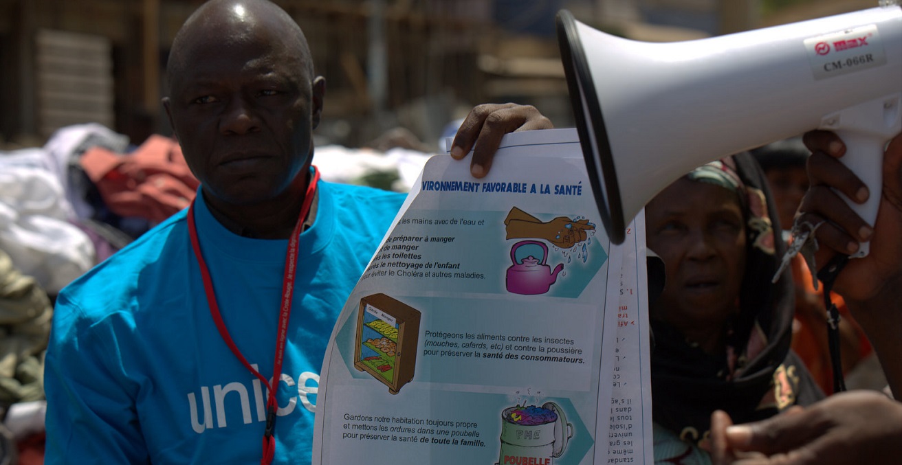 UNICEF and partners took to the streets of Conakry to combat the Ebola outbreak with information on how to keep families safe and to prevent the spread of disease. Source: UNICEF Guinea https://www.flickr.com/photos/unicefguinea/13990236168