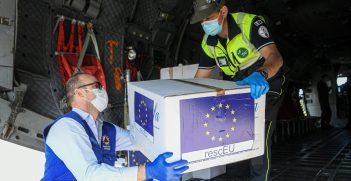 A box of masks is unloaded from a cargo plane in Milan, Italy. Source: European Union https://bit.ly/2AfHr6A
