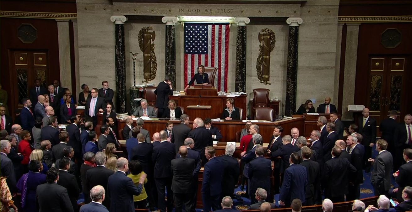 On December 18, 2019, United States House of Representatives votes to adopt the articles of impeachment, accusing Donald Trump of abuse of power and obstruction of Congress. Source: House Floorcast https://bit.ly/2zflcxy