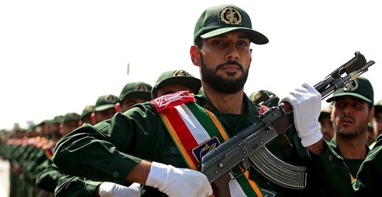 A soldier of the Iranian Revolutionary Guard Corps marches in a military parade commemorating the first day of Holy Defence Week in Qom, Iran. Source: Mohammad Ali Marizad https://bit.ly/3bbhsKn