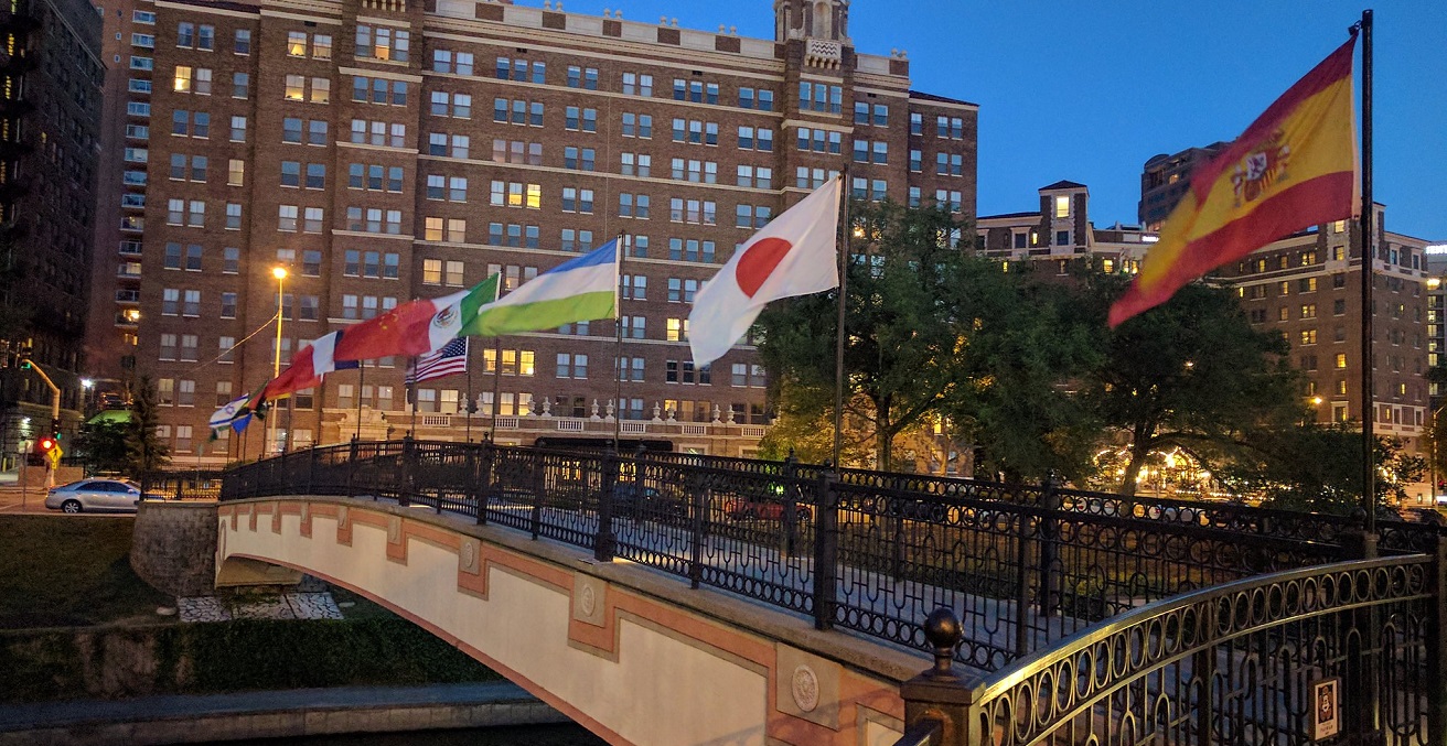 A bridge in Kansas City, Missouri, USA displays the flags of its sister cities. Source: Drew Tarvin https://bit.ly/2Wd5gUe