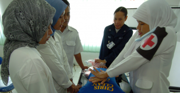 An Indonesian nurse practices CPR during a class taught by military members, assigned to the Military Sealift Command (MSC) hospital ship USNS Mercy (T-AH 19), at Tentera Nasional Indonesia Military Hospital in Banda Aceh, Indonesia. Source:  US Navy/Rebecca J. Moat https://bit.ly/3fjcuPf