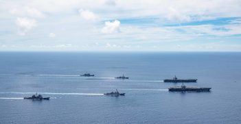 The USS Ronald Reagan (CVN 76) and USS Nimitz (CVN 68) Carrier Strike Groups (CSGs) steam in formation. Source: Petty Officer 3rd Class Jason Ta https://bit.ly/3ePbwbT