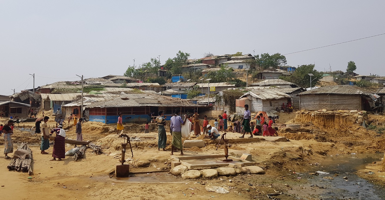 Community members gather around a water point in the main Kutupalong-Balukhali camp near Cox’s Bazar. Photo supplied by the ICRC.