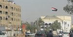 The Iraq flag flies over the Baghdad National Theatre. Source: zin_live https://bit.ly/3a9ossF 
