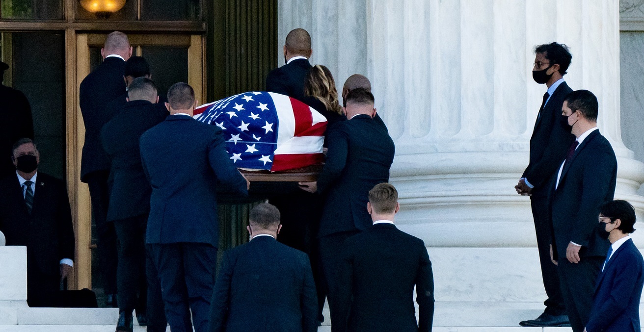 Ruth Bader Ginsburg's casket being carried into the Supreme Court, as her former law clerks line the steps.
Source: Victoria Pickering, https://bit.ly/3cMtRHb