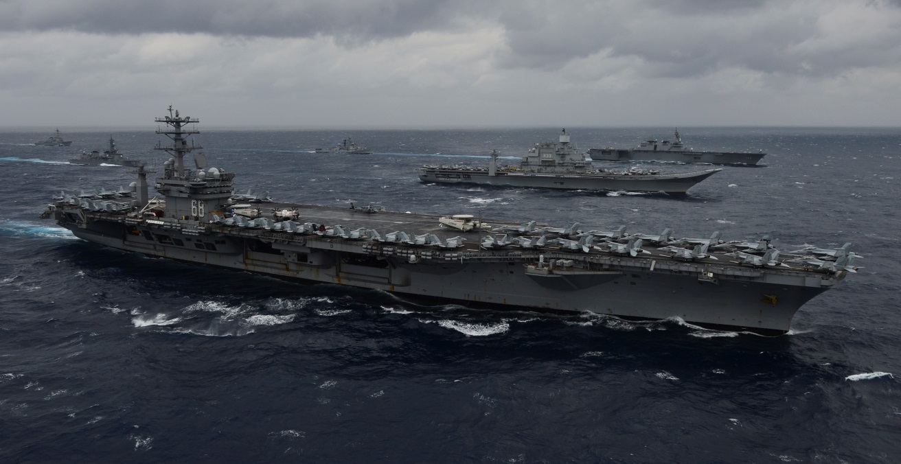 Ships from the Indian Navy, Japan Maritime Self-Defense Force (JMSDF) and the U.S. Navy sail in formation in the Bay of Bengal as part of Exercise Malabar 2017. Source: Mass Communication Specialist 3rd Class Cole Schroeder/US Navy https://bit.ly/3oyDDCp