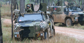 Two Bushmasters operated by the 2nd Battalion, Royal Australian Regiment during an exercise. Source: Wikimedia Commons https://bit.ly/3p1ab73