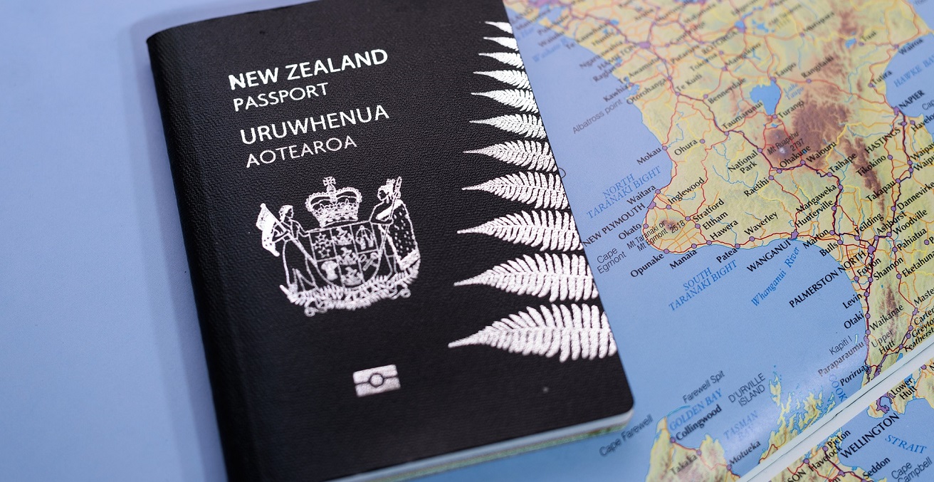 New Zealand passport on map of New Zealand. Source: Astize https://bit.ly/3v5u8Ny