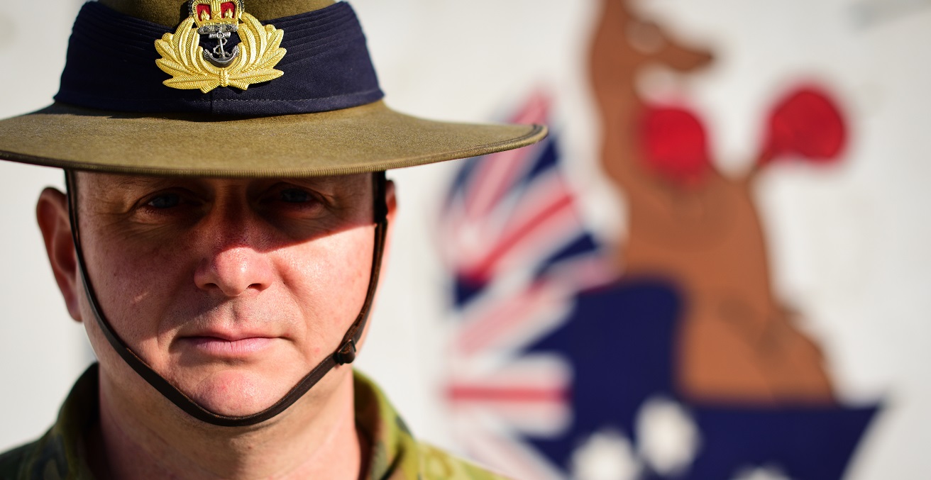 Royal Australian Navy Commander Sands Skinner is the director of maintenance for TAAC-Air on Forward Operating Base Oqab, Kabul, Afghanistan, on Jan. 26, 2019. Skinner led a formation in observance on Australia Day on the FOB as the highest ranking Australian officer in attendance. Source: U.S. Air Force/Staff Sgt. Ariel D. Partlow https://bit.ly/3ukf8ug 