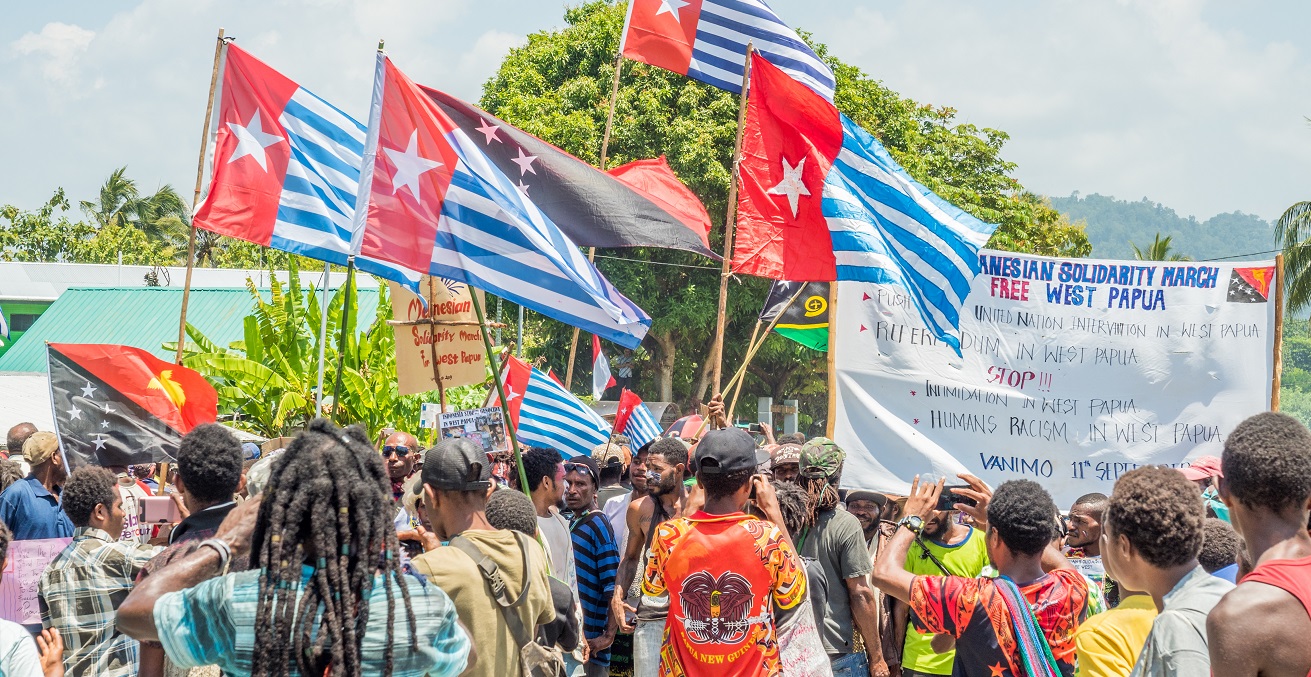  Local people from PNG manifest, protest against Indonesian government to finally give West Papua independence and release them free, manifestation, demonstration. Source:  Anna_plucinska/Shutterstock.