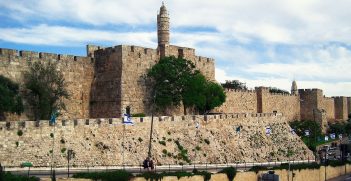 The 16th century walls of Jerusalem, with the Jerusalem Citadel minaret. Source: Oleg Moro https://bit.ly/35yQAnt