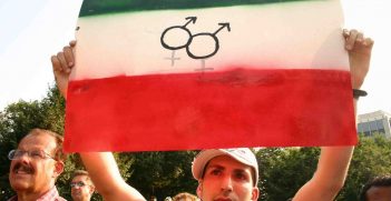 A protestor holds a sign calling for protection of gay rights in Iran. Source: Elvert Barnes https://bit.ly/3zAsnuA