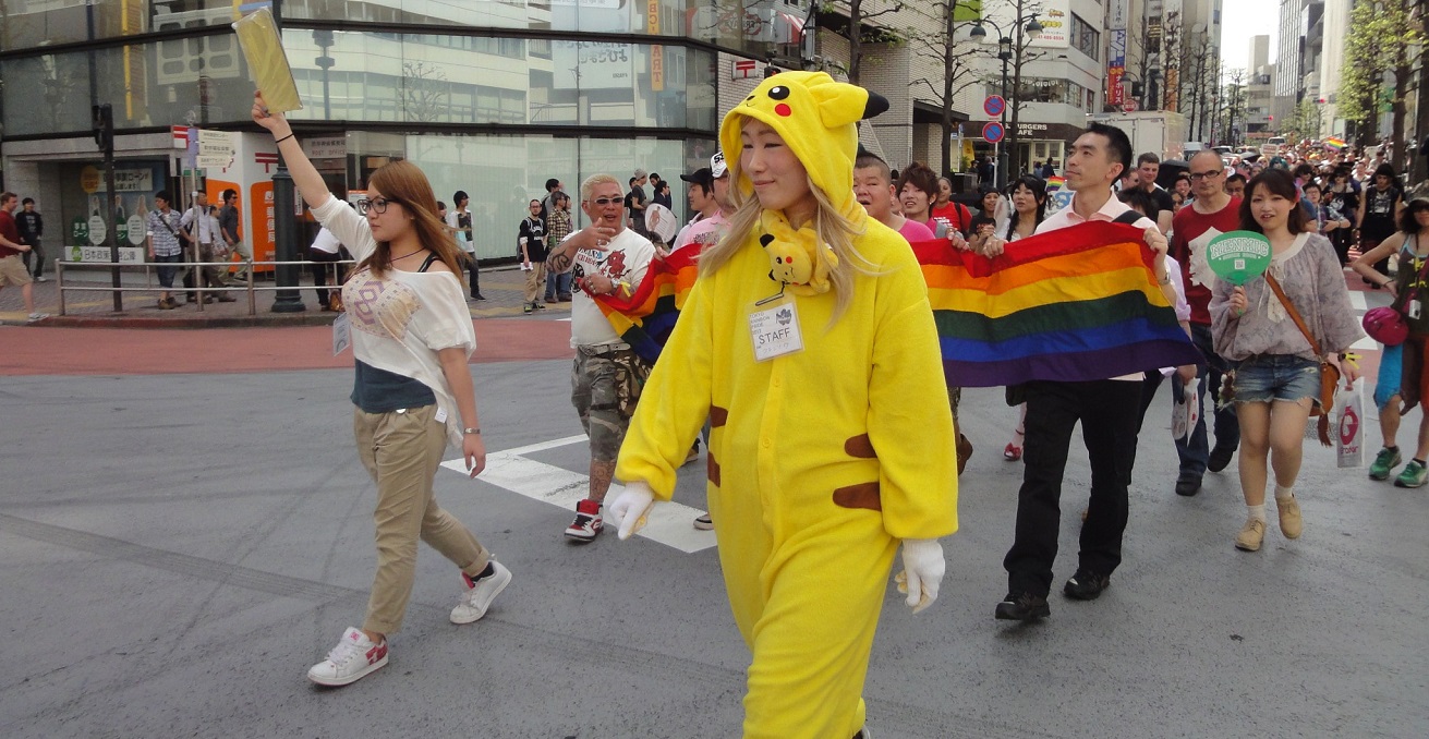 People marching, including one dressed as Pikachu, in a Tokyo Pride Parade. Source: Lauren Anderson https://bit.ly/3xb2ZKi