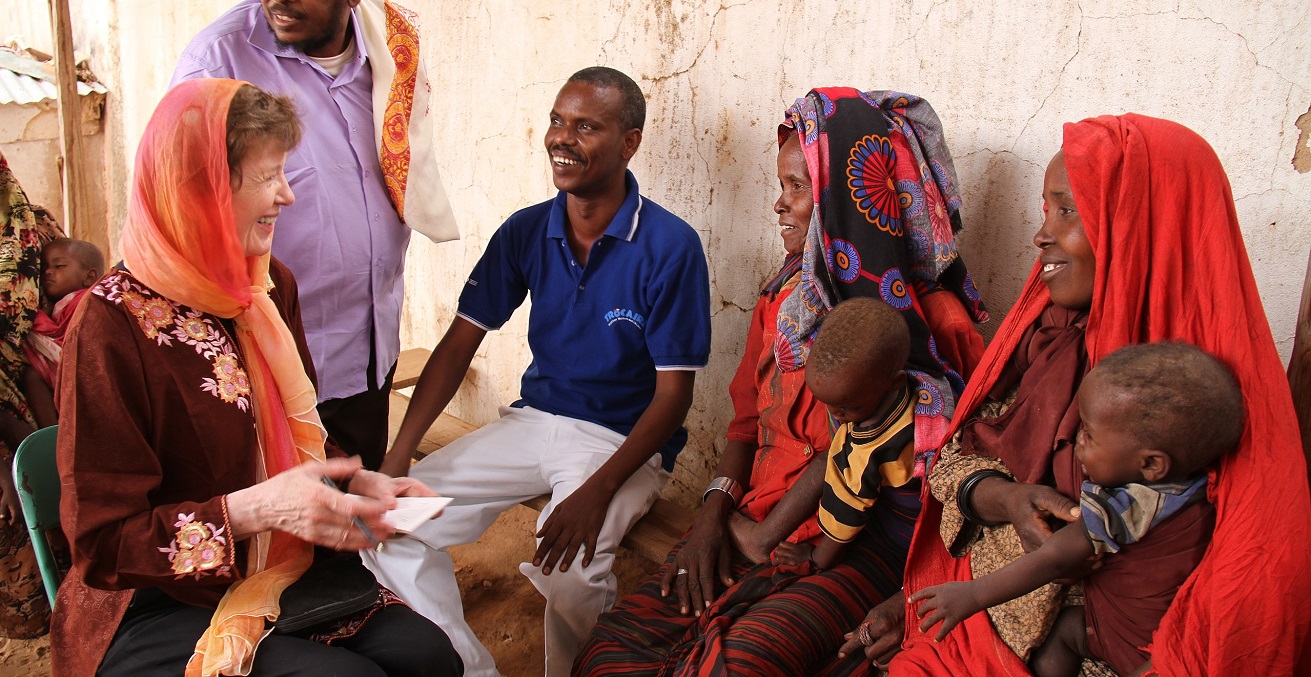 Mary Robinson with Trocaire staff with mothers and children who are attending the Trócaire's Dollow Health Centre, Dollow, Somalia. Source: Jennifer O'Gorman/Trocaire https://bit.ly/3xrkmWH