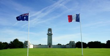 French and Australian flags fly at The Australian War Memorial in Villers Bretonneux. Source: James Robson 93 https://bit.ly/3uQpILz