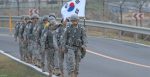 Republic of Korea Army officers joined Korean Augmentation to the United States Army Soldiers (KATUSAs) for a rucksack march in commemoration of the 62nd anniversary of the Korean War. Source: U.S. Army photos by Cpl. Han, Jae Ho https://bit.ly/3Amr81e