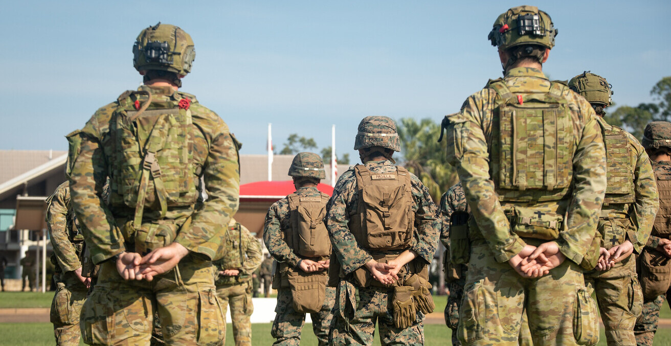 Marines, Australian Army soldiers and Japanese Self-Defense Force members come together to commemorate an official opening ceremony for the beginning of exercise Southern Jackaroo, 2021. Source: U.S. Indo-Pacific Command https://bit.ly/3Gzd4FE 