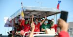 Former Senator Ferdinand Marcos Jr. and presidential daughter Davao City Mayor Sara Z. Duterte wave to the crowd from their float during a grand caravan along Commonwealth Avenue in Quezon City on Wednesday, Dec. 8, 2021). Source: PNA/Joey O. Razon https://bit.ly/3tU1Ubc 