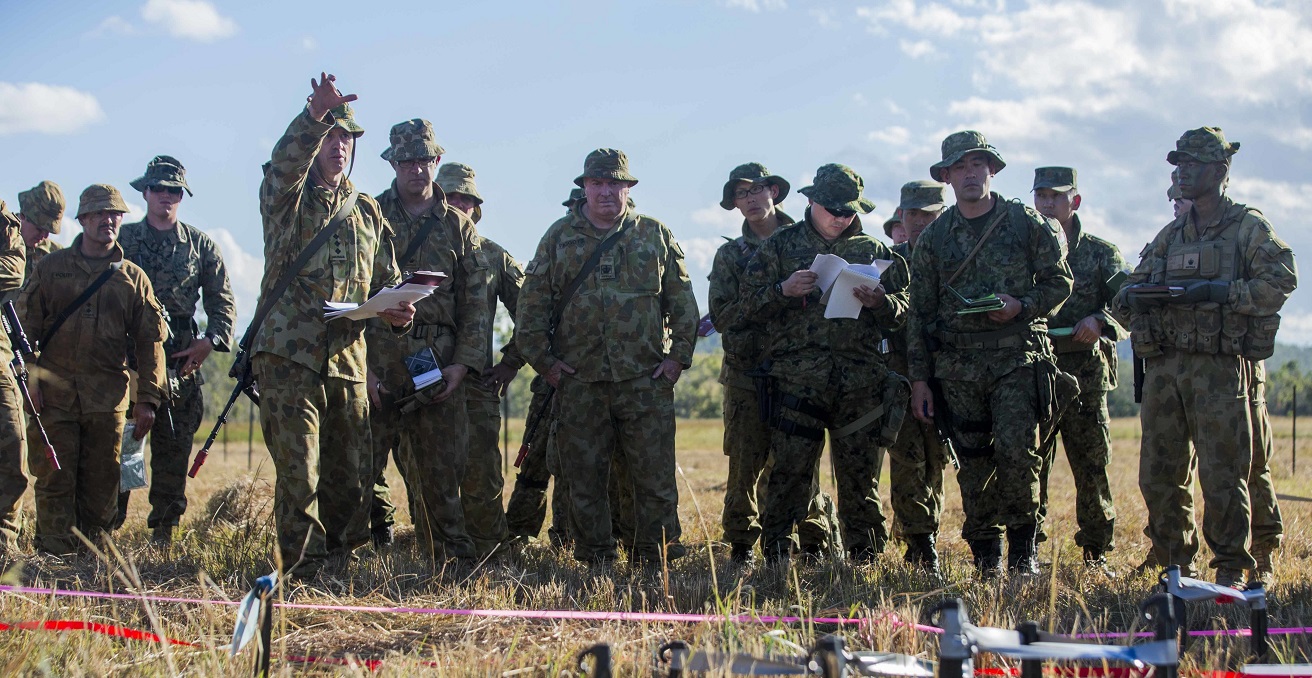 U.S. Marines with 1st Battalion, 1st Marine Regiment, members of the Australian Army with Battle Group Waratah, 8th Brigade, and members of the Japan Ground Self-Defense Force discuss future plans for Exercise Southern Jackaroo at Shoalwater Bay, Queensland, Australia, May 18, 2016. Exercise Southern Jackaroo is a combined training opportunity during Marine Rotational Force – Darwin (MRF-D). MRF-D is a six-month deployment of Marines into Darwin, Australia, where they will conduct exercises and train with the Australian Defence Forces, strengthening the U.S.-Australia alliance. (U. S. Marine Corps Photo by MCIPAC Combat Camera Lance Cpl. Osvaldo L. Ortega III/Released)